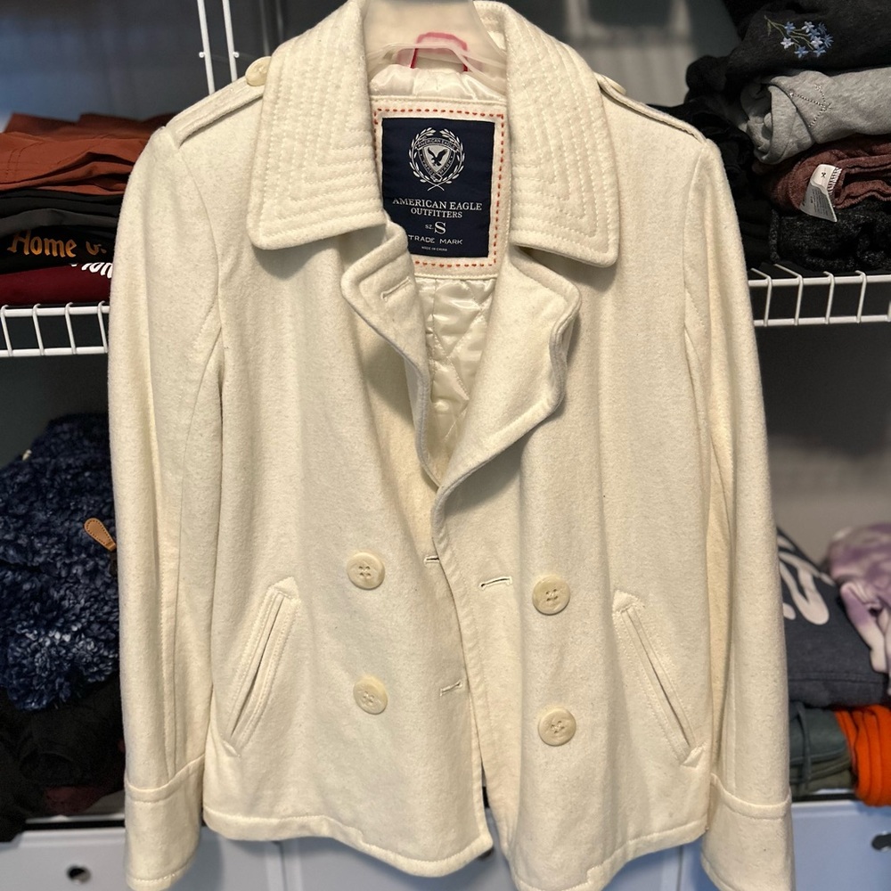 Creamy white button up waist-length peacoat